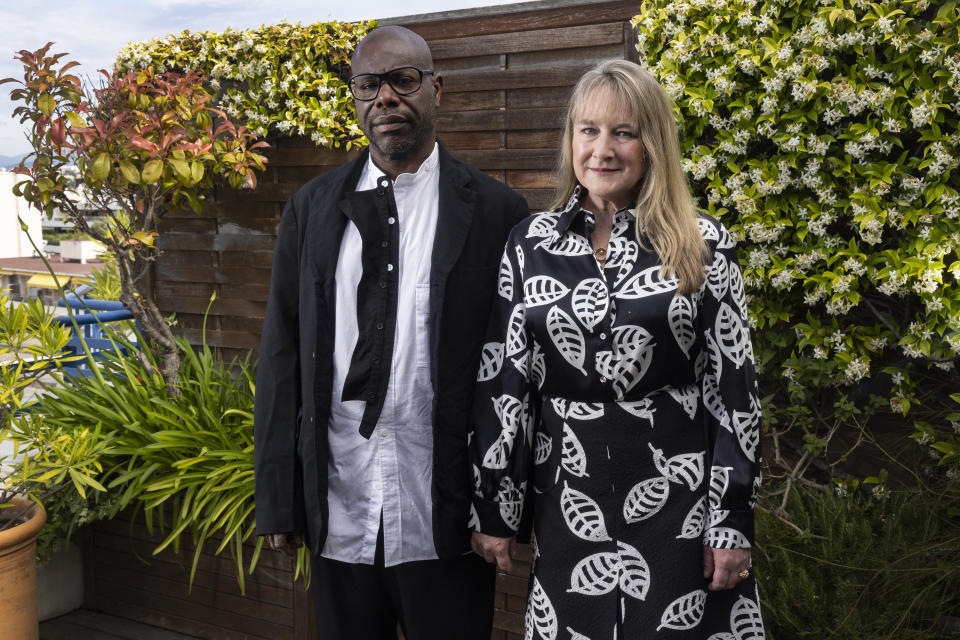 Director Steve McQueen, left, and writer Bianca Stigter pose for portrait photographs for the film 'Occupied City' at the 76th international film festival, Cannes, southern France, Wednesday, May 17, 2023. (Photo by Joel C Ryan/Invision/AP)