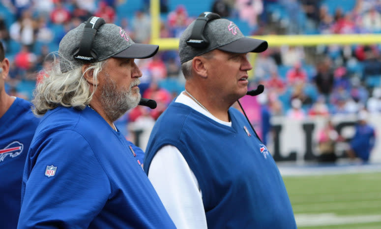 rob and rex ryan on the sideline during a game