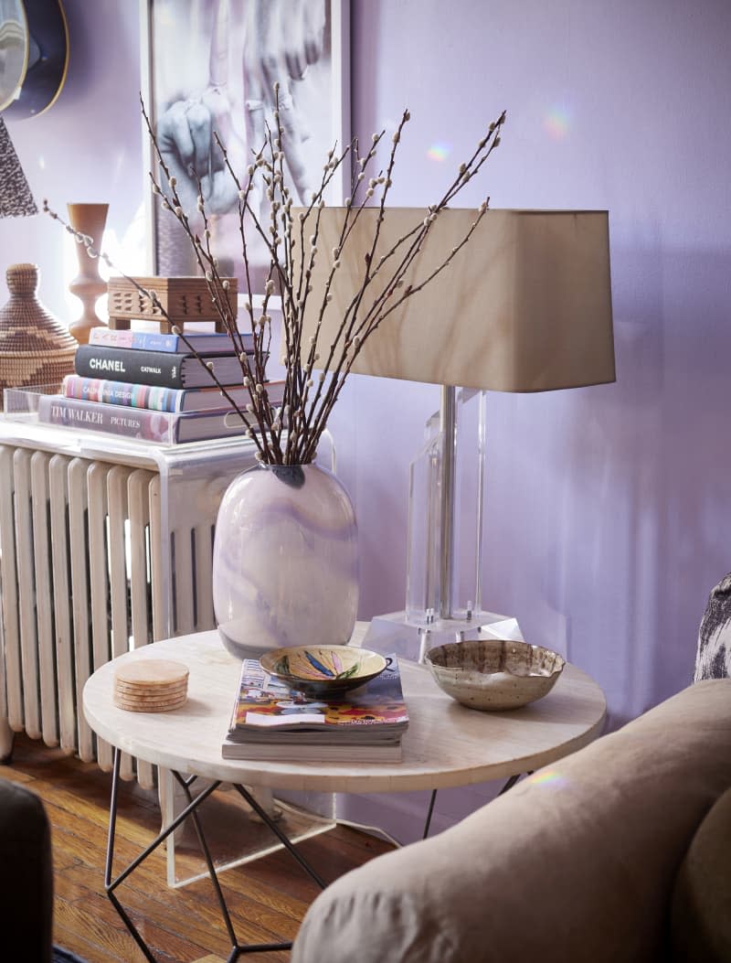 Brand arrangement on living room side table.