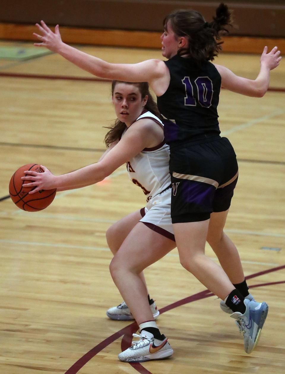 Puyallup's Emily Randolph (10) puts the pressure on South Kitsap's Mika Brady during the second half of their game in Port Orchard on Thursday, Jan. 5, 2023.