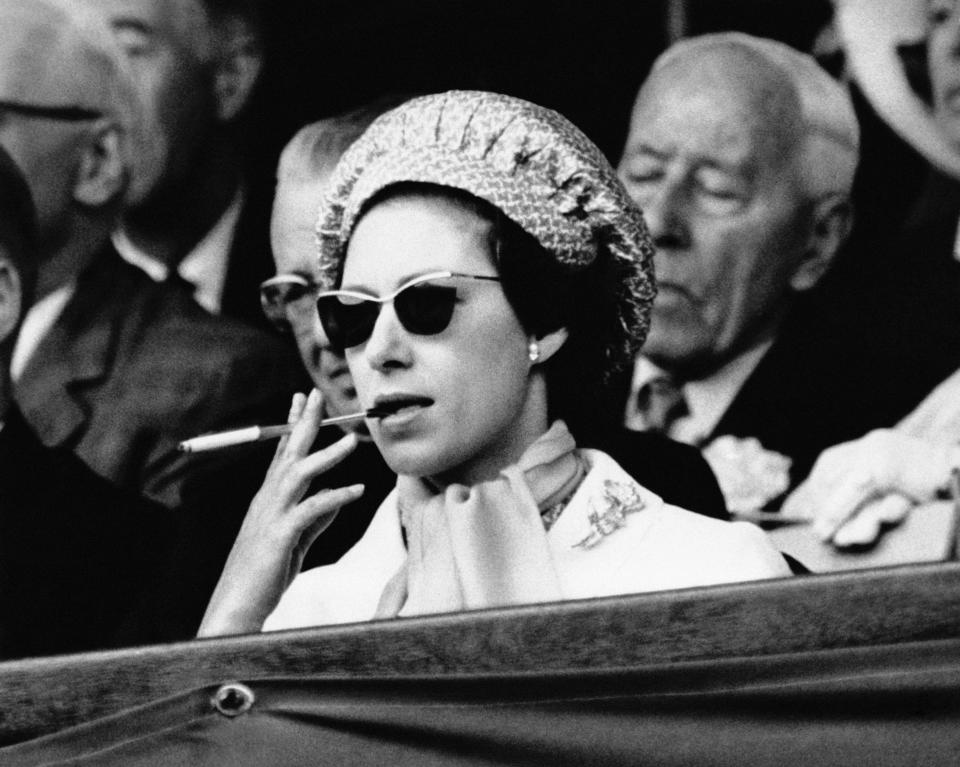 <p>Back in 1956, Princess Margaret proved that she’s the real Queen of the game, as she smoked a cigarette in the royal box watching the Wimbledon Men’s Finals. We knew she was our favourite character in ‘The Crown’ for a reason… <em>[Photo: Getty]</em> </p>