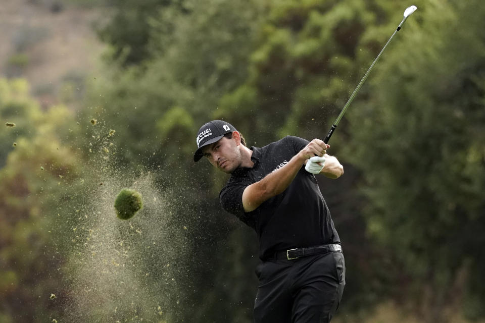 Patrick Cantlay hits from the 18th fairway during the third round of the Zozo Championship golf tournament Saturday, Oct. 24, 2020, in Thousand Oaks, Calif. (AP Photo/Marcio Jose Sanchez)