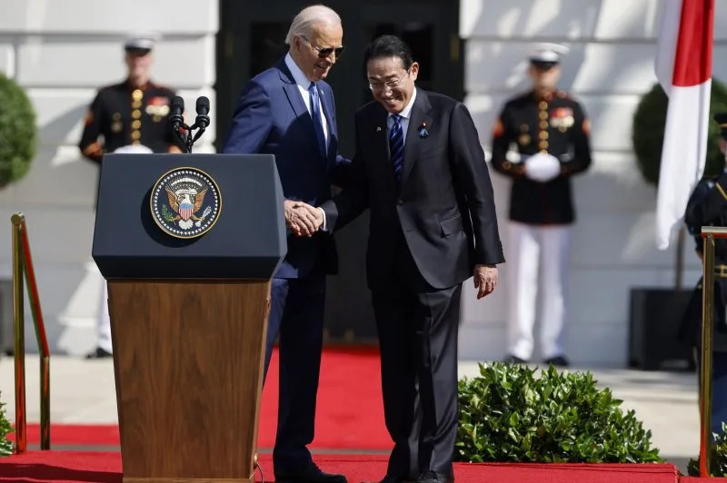 U.S. President Joe Biden welcomes Japan's Prime Minister Fumio Kishida during an arrival ceremony on the South Lawn to begin Kishida's official visit to the White House in Washington, D.C., on Wednesday. Pool Photo by Jonathan Ernst/UPI