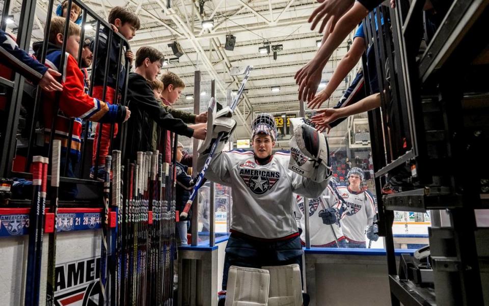 Americans goaltender Tomas Suchanek is greeted by fans as he leaves the ice during the 2022-23 season.