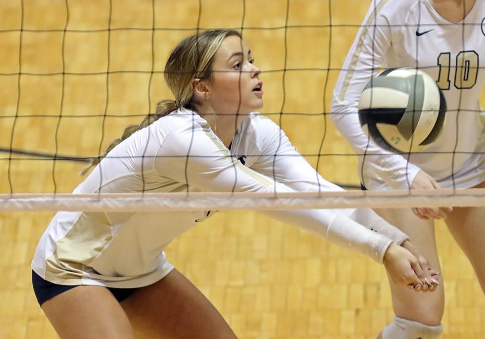 Hoban's Macie Mintz gets under a ball during a Division II sectional against Glenville on Oct. 19, 2022, in Akron.