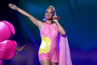 Perry performed at the ICC Women's T20 Cricket World Cup Final wearing a bubblegum pink playsuit complete with an embellished yellow flower and a pink cape. If all pink pregnancy capes look this good, they should be mandatory. (Getty Images)