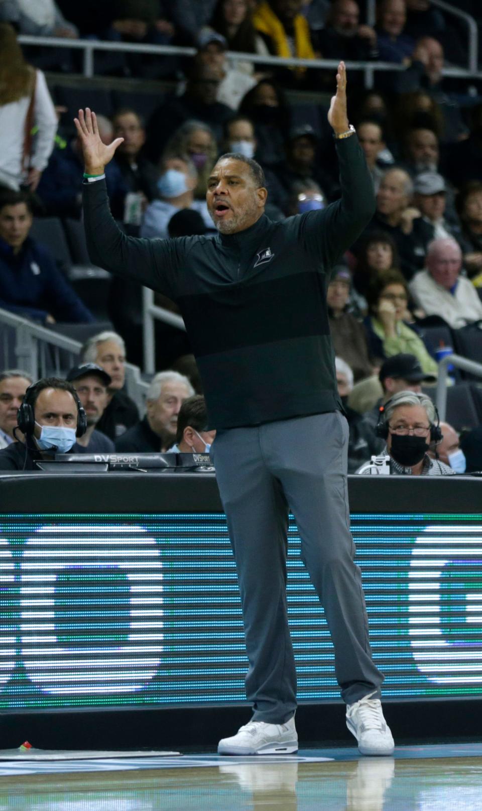 Coach Ed Cooley questions a call from the sidelines during a recent Friars game.