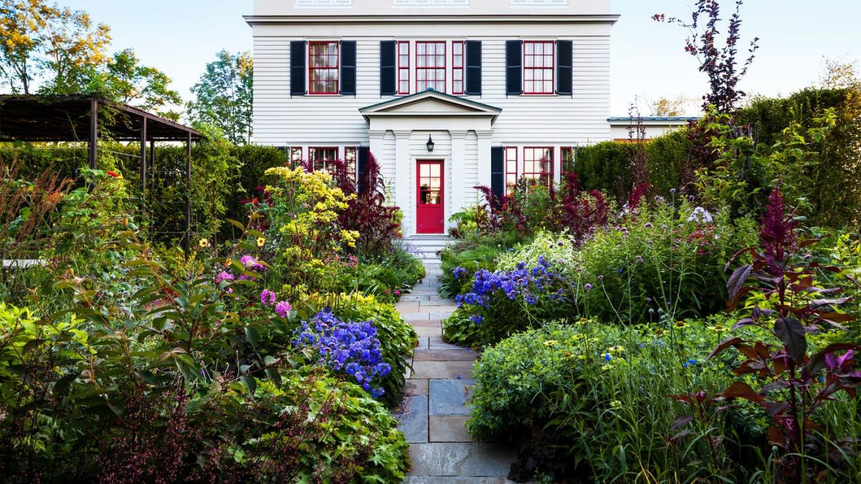 a house with a garden in front of it