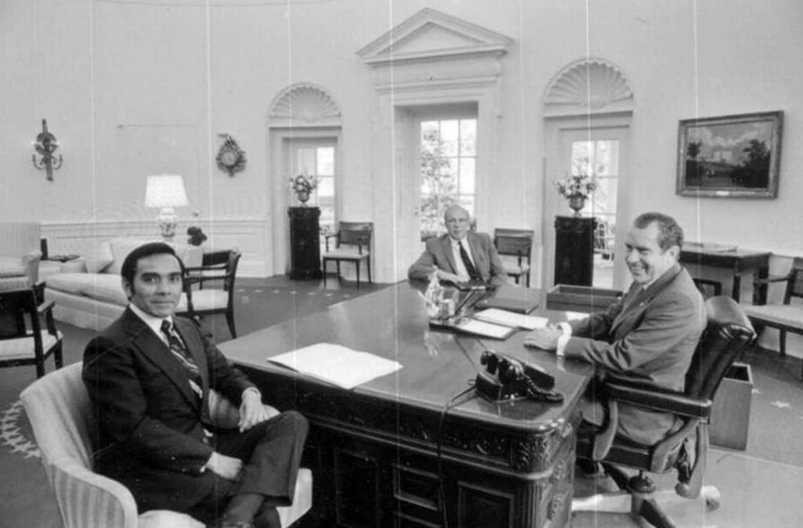 President Nixon meets with Phillip V. Sanchez and George P. Schultz, U.S. Secretary of Treasury (1972-74).