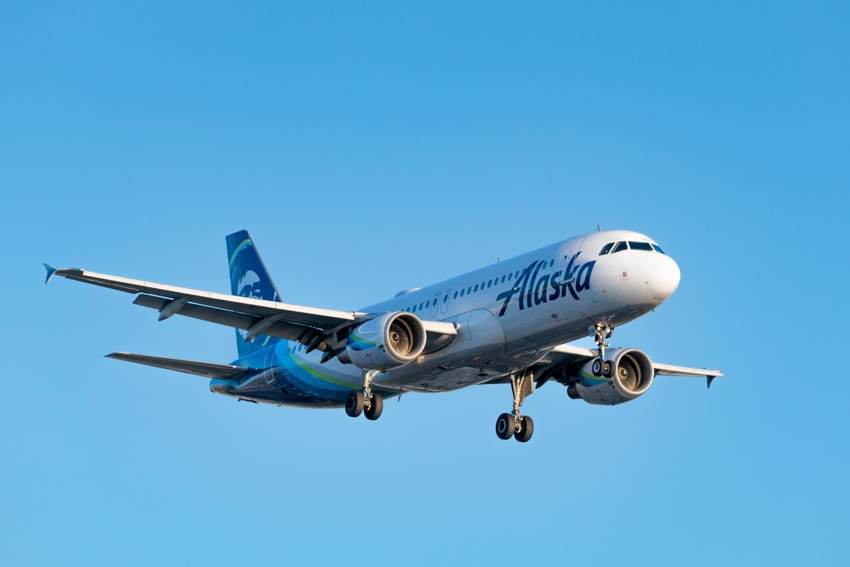 An Alaska Airlines plane in flight.
