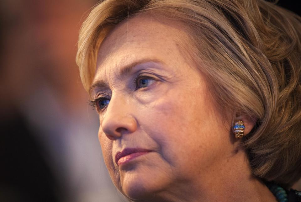 Former U.S. Secretary of State and former U.S. first lady Hillary Clinton sits and watches during the Clinton Global Initiative 2013 (CGI) in New York September 24, 2013. REUTERS/Carlo Allegri (UNITED STATES - Tags: POLITICS HEADSHOT)