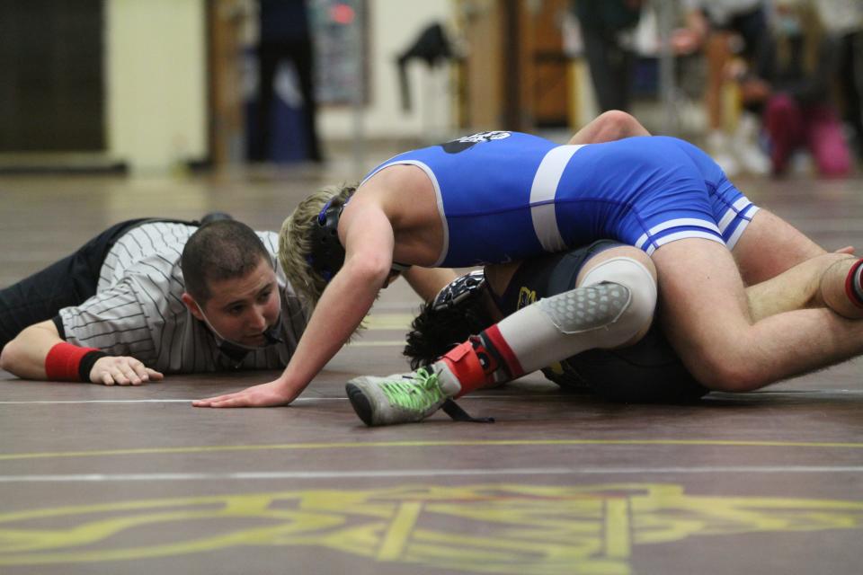 Pearl River's Aidan Veirun (top) on his way to pinning Clarkstown North's Seth Frendel in the Rockland County 132-pound championship match. Veirun was named the Most Outstanding Wrestler of the Tournament.