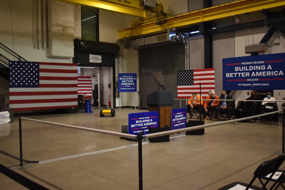 Audience members wait for President Joe Biden to arrive at Mill 19 in Pittsburgh&#39;s Hazelwood neighborhood to discuss in $1.2 trillion infrastructure plan.