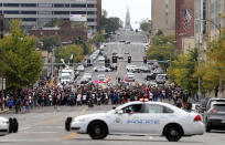 <p>Demonstrators protest outside the St. Louis Police Department headquarters in response to a not guilty verdict in the trial of former St. Louis police officer Jason Stockley Sunday, Sept. 17, 2017, in St. Louis. Stockley was acquitted on Friday in the 2011 killing of a black man following a high-speed chase. (Photo: Jeff Roberson/AP) </p>