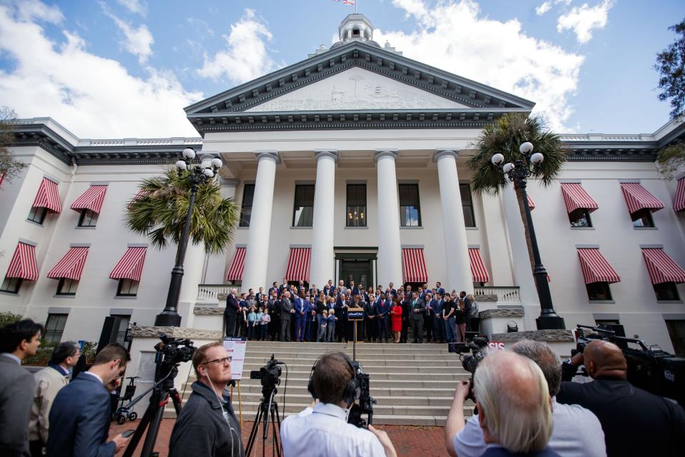 Legislators gather on the steps of the Historic Capitol for a news conference regarding the fatherhood crisis in Florida on Wednesday, Feb. 16, 2022.