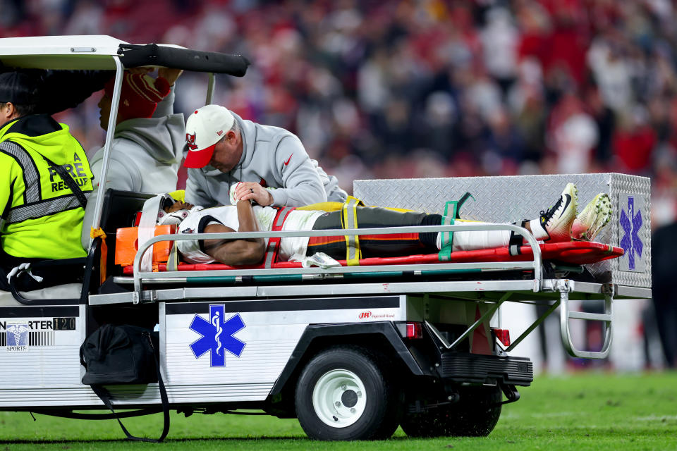 TAMPA, FLORIDA - JANUARY 16: Russell Gage #17 of the Tampa Bay Buccaneers is carted off the field after suffering an injury against the Dallas Cowboys during the fourth quarter in the NFC Wild Card playoff game at Raymond James Stadium on January 16, 2023 in Tampa, Florida. (Photo by Mike Ehrmann/Getty Images)