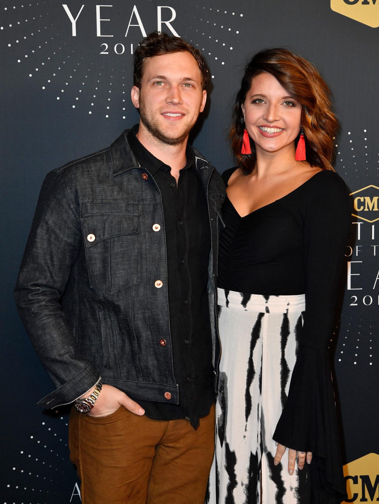 Phillip Phillips and wife Hannah Blackwell on the red carpet before the 2017 CMT Artists of the Year show on Oct. 18, 2017 in Nashville.