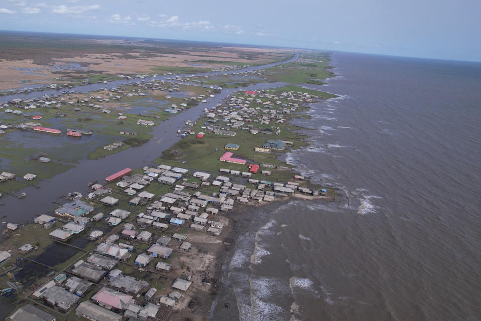 In this screen grab taken from a drone video, a view of the coastal erosion in Ayetoro, Southwest Nigeria, Friday, April 5, 2024. Ayetoro, a coastal community more than 200 km southeast of Nigeria's business capital Lagos, has been experiencing coastal erosion for many years. But the changes have recently rapidly worsened with the community slumping into the Atlantic Ocean, leading to repeated displacements of households and businesses. (AP Photo/Dan Ikpoyi)