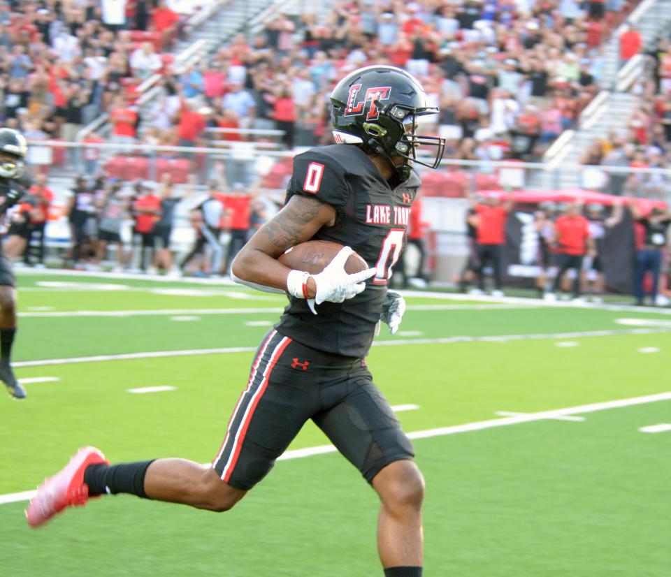 It's smooth sailing for Caleb Burton as he scores his first touchdown of the season, taking a pass from Isaac Norris 41 yards to give Lake Travis a 7-0 lead against Arlington Martin.