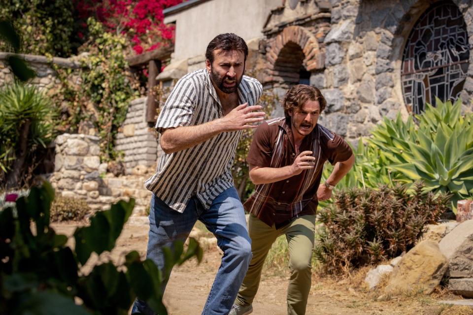 Nicolas Cage and Pedro Pascal running.