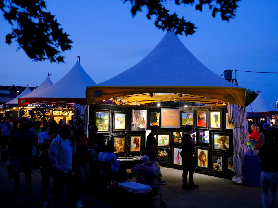 Artists show their work in tents April 22, 2022, along the west side of the Festival of the Arts in downtown Oklahoma City.