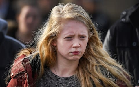 Alesha MacPhail's mother Georgina Lochrane leaves Glasgow High Court following the judge lifting the ban on the murderers anonymity - Credit: Getty Images