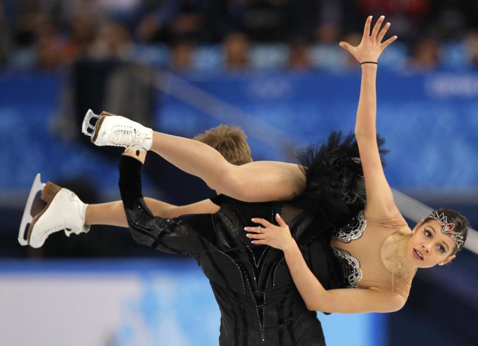 Elena Ilinykh and Nikita Katsalapov of Russia compete in the ice dance free dance figure skating finals at the Iceberg Skating Palace during the 2014 Winter Olympics, Monday, Feb. 17, 2014, in Sochi, Russia. (AP Photo/Vadim Ghirda)