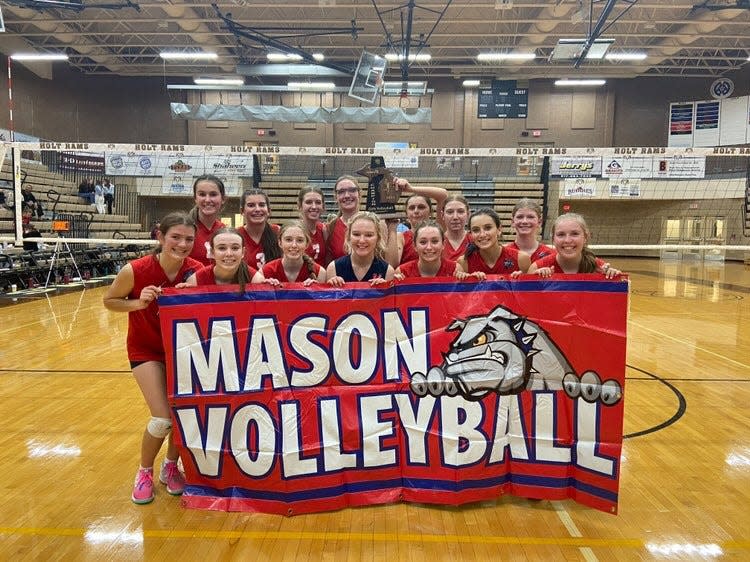 Mason volleyball swept Okemos to win a Division 1 district title at Holt on Thursday, Nov. 2, 2023.