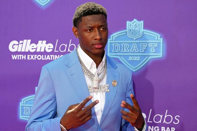 Sauce' Gardner wears diamond necklace, hot sauce bottle to NFL Draft