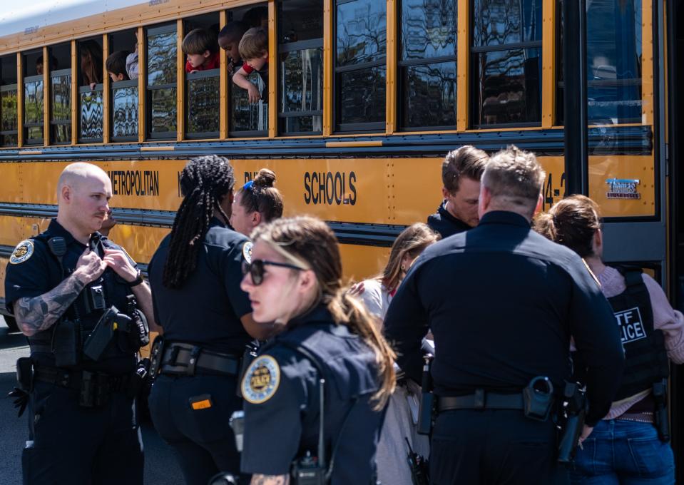 School buses with children arrive at Woodmont Baptist Church to be reunited with their families after a mass shooting at The Covenant School on March 27, 2023 in Nashville, Tennessee (Getty Images)