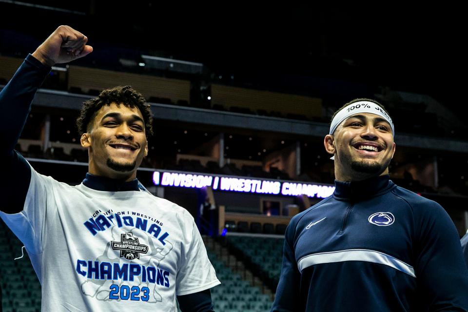 Penn State's Carter Starocci, left, and Aaron Brooks celebrate in the finals during the sixth session of the NCAA Division I Wrestling Championships, Saturday, March 18, 2023, at BOK Center in Tulsa, Okla.