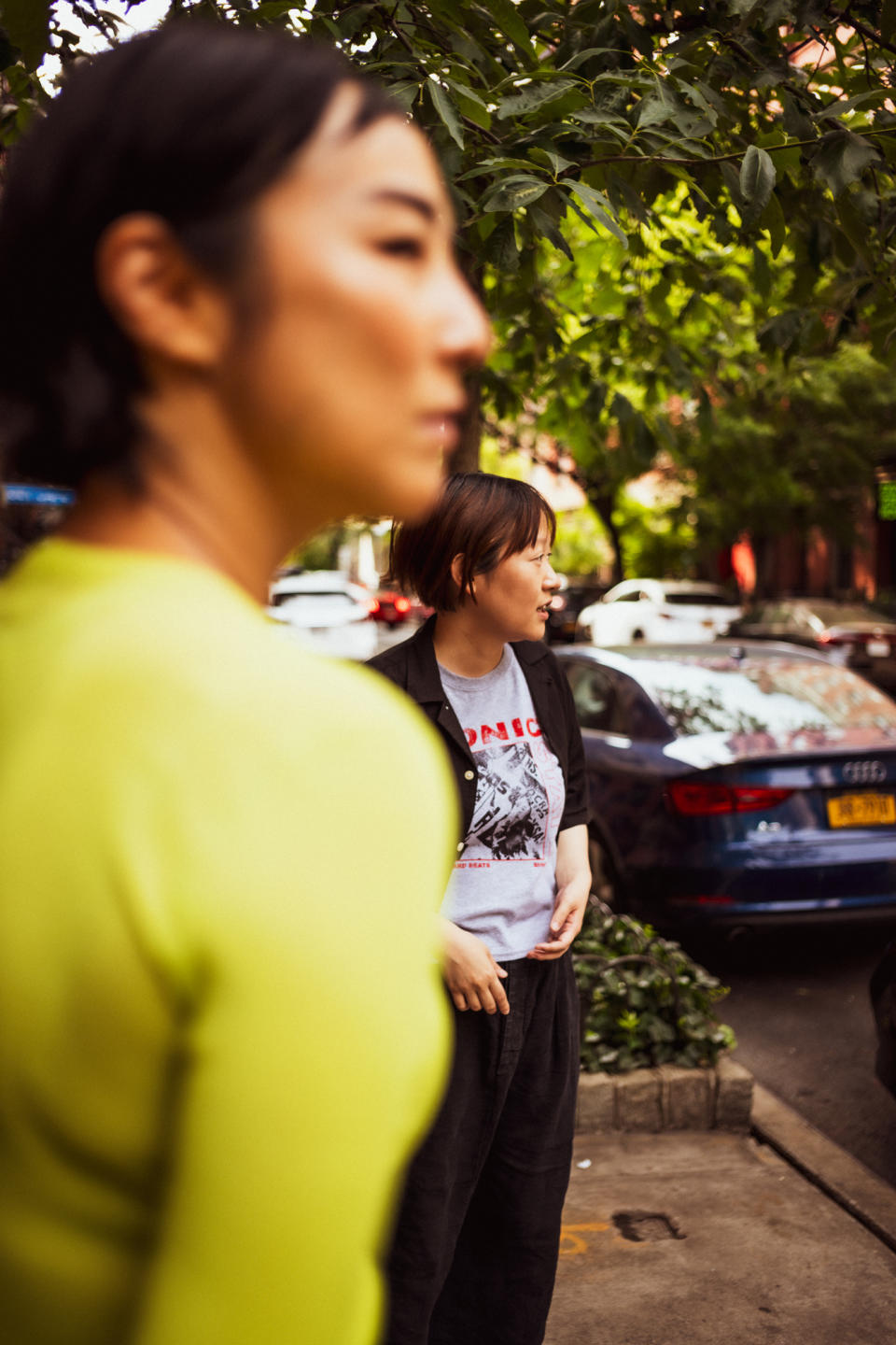 Greta Lee and Celine Song walking around Manhattan's East Village on June 20, 2023.