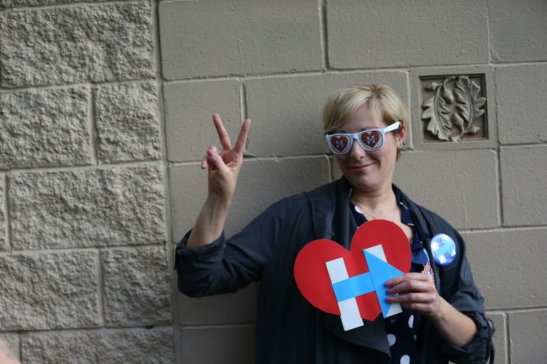 Jill Huennekens waits for the arrival of Democratic presidential candidate Hillary Clinton at her campaign stop on May 1, 2016 in Indianapolis, Indiana