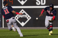 Atlanta Braves right fielder Ronald Acuna Jr. (13) works for a catch on an RBI-single hit by Philadelphia Phillies Rhys Hoskins during the sixth inning in Game 4 of baseball's National League Division Series, Saturday, Oct. 15, 2022, in Philadelphia. (AP Photo/Matt Slocum)