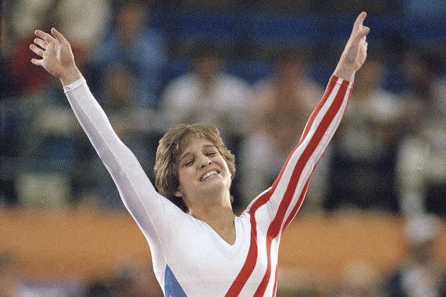 <p>AP Photo/Lionel Cironneau</p> Mary Lou Retton at the 1984 Olympic Games in Los Angeles