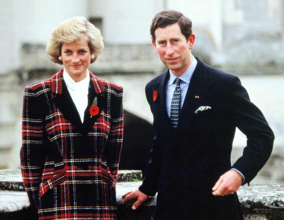 Charles and Diana, Prince and Princess of Wales, pose outside Chateau de Chambord during their official visit to France on November 9, 1988 in Chambord, France