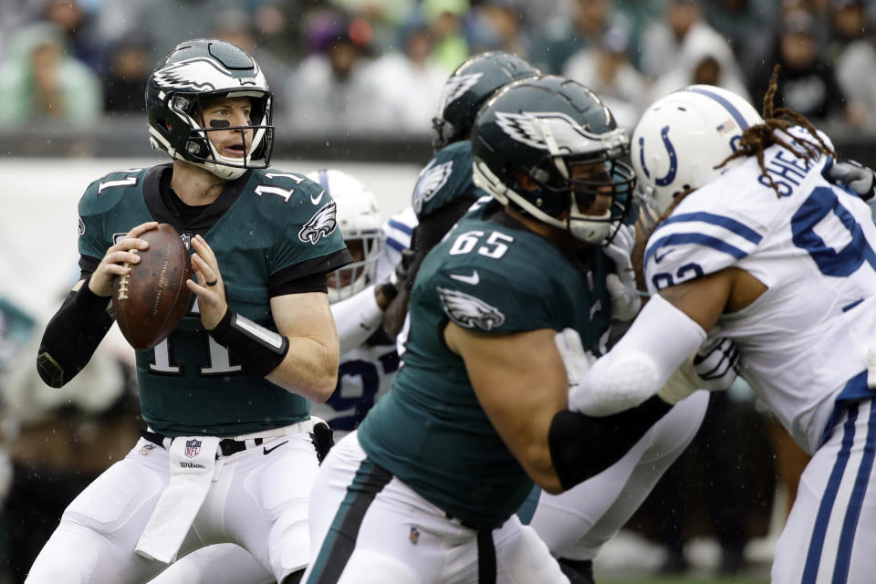 Philadelphia Eagles' Carson Wentz looks to pass during the first half of an NFL football game against the Indianapolis Colts, Sunday, Sept. 23, 2018, in Philadelphia. (AP Photo/Matt Rourke)