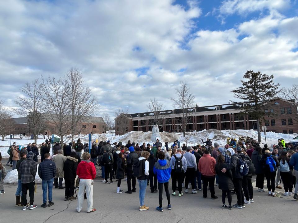 LSSU students and other locals gather to watch the annual burning of the snowman on the first day of spring on March 20, 2023.