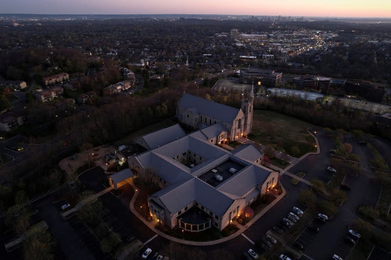 FILE PHOTO: People visit a memorial after deadly shooting at the Covenant School in Nashville