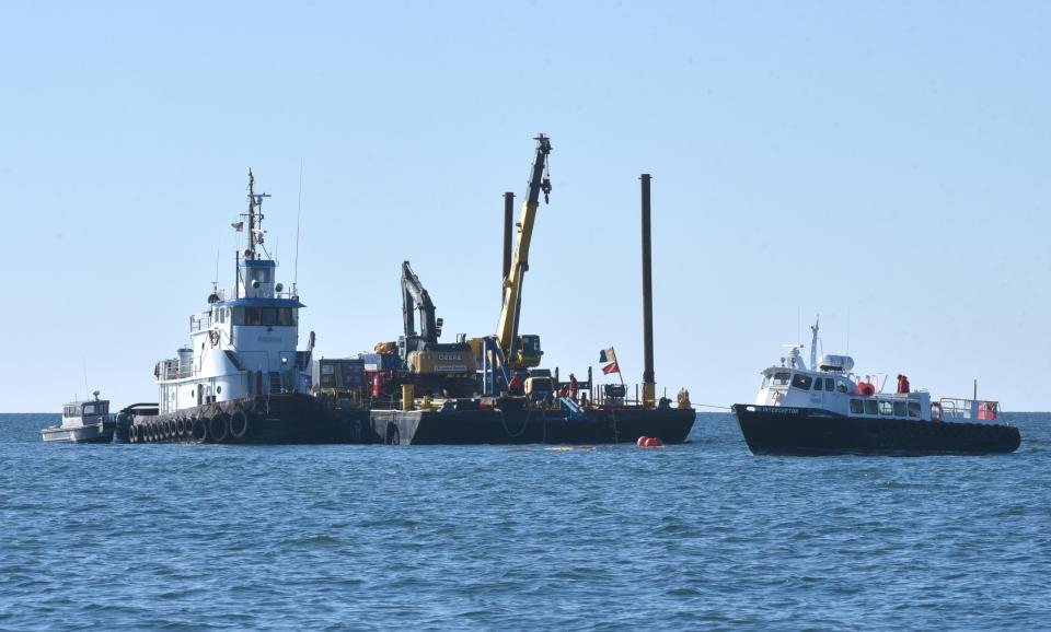 New England fisheries groups recently compiled a report on the threats posed by offshore wind development to commercial fishing in the Gulf of Maine. Above, cable laying equipment sits off shore of Covell's Beach in Centerville in February 2022  for the Vineyard Wind project.