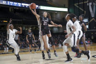 South Carolina forward Mikiah Herbert Harrigan (21) reaches for a rebound against Vanderbilt in the first half of an NCAA college basketball game Sunday, Jan. 12, 2020, in Nashville, Tenn. (AP Photo/Mark Humphrey)