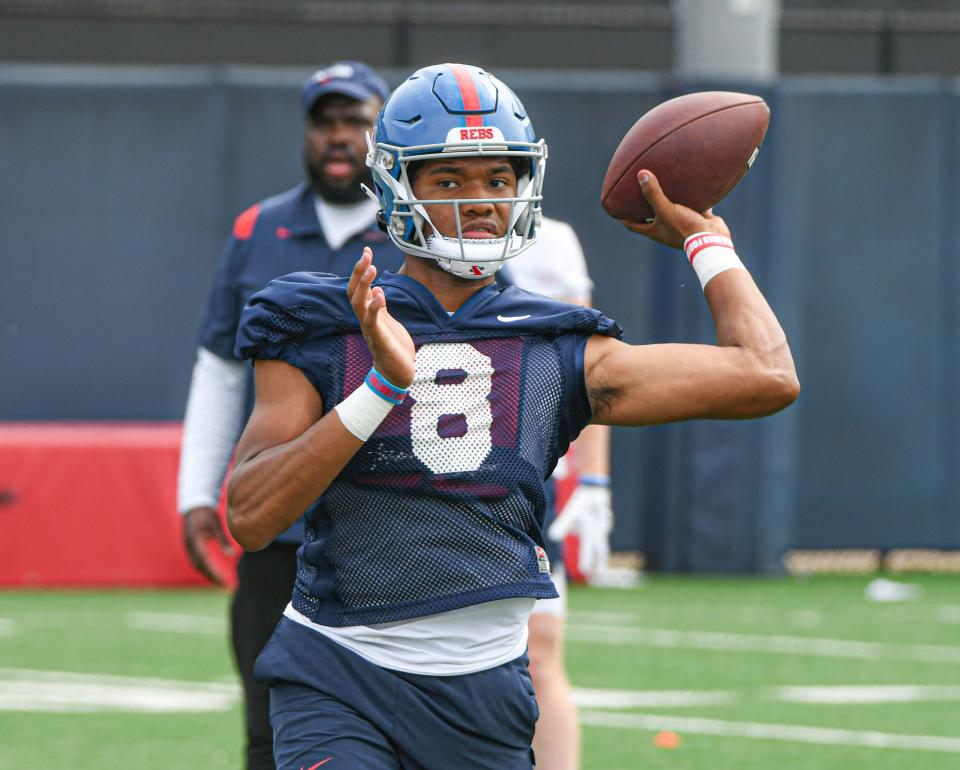 Quarterback Austin Simmons throws a pass on Aug. 11 at Ole Miss football practice in Oxford, Mississippi. While in high school at Pahokee, Simmons was suspended for five games in 2021 after he was found to be in violation of the FHSAA's regulation against falsification of information.