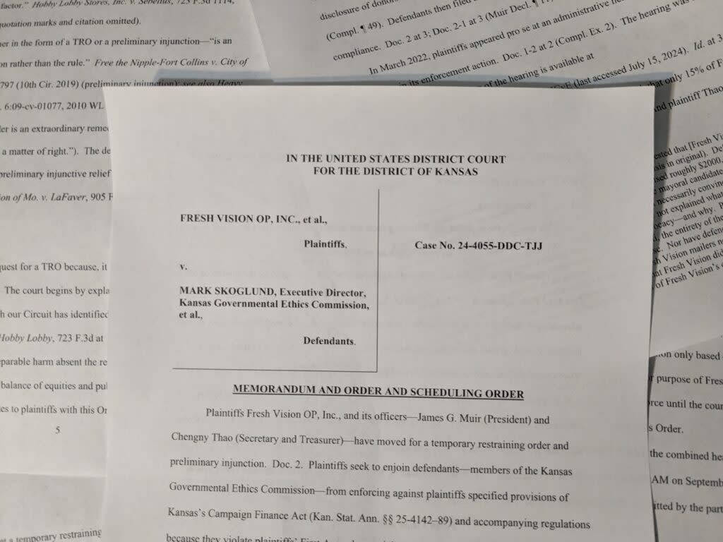 A federal judge in Kansas issued a temporary order forbidding enforcement of a state campaign finance law that an Overland Park nonprofit organization believes violates constitutional rights. (Tim Carpenter/Kansas Reflector)