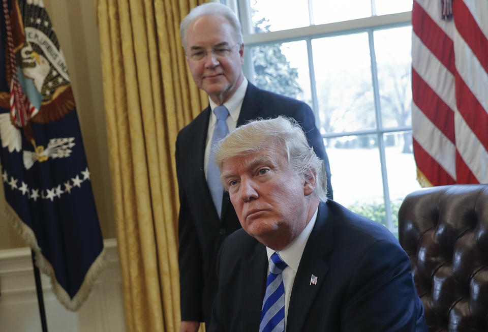 FILE – In this March 24, 2017 file photo, President Donald Trump with Health and Human Services Secretary Tom Price are seen in the Oval Office of the White House in Washington. Congress is launching a wide-ranging examination of air travel by high-ranking Trump administration officials. The House Oversight and Government Reform committee is following up on reports that health secretary Tom Price used pricey charters when cheaper commercial flights would have done. (AP Photo/Pablo Martinez Monsivais, File)