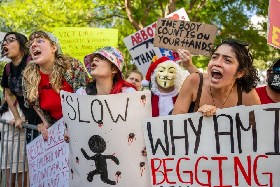 Gun control advocates confront attendees of the National Rifle Association (NRA) annual convention at the George R. Brown Convention Center on May 28, 2022 in Houston, Texas. (Getty Images)