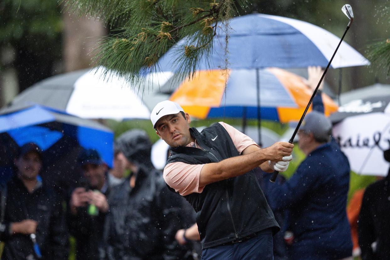 Scottie Scheffler, the 2022 Masters champion, hits a shot at the 11th hole of the Players Stadium Course at TPC Sawgrass during the 2022 Players Championship.