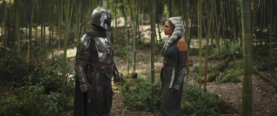 (L-R): The Mandalorian (Pedro Pascal) and Ahsoka Tano (Rosario Dawson) in Lucasfilm's THE BOOK OF BOBA FETT, exclusively on Disney+. Â© 2022 Lucasfilm Ltd. & â„¢. All Rights Reserved.