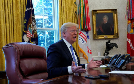 U.S. President Donald Trump speaks during an interview with Reuters at the White House in Washington, U.S., January 17, 2018. REUTERS/Kevin Lamarque