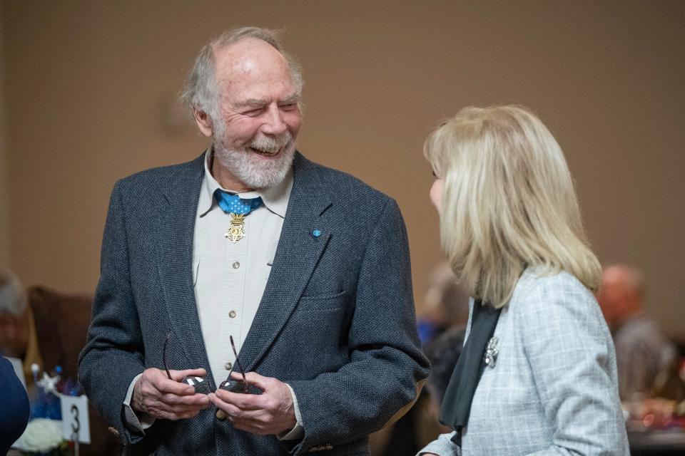 Medal of Honor recipient Drew Dix and Pueblo Community College President Patty Erjavec chat during the Mt. Carmel Veterans Service Center Salute to Heroes event on Thursday, Jan. 19, 2023.