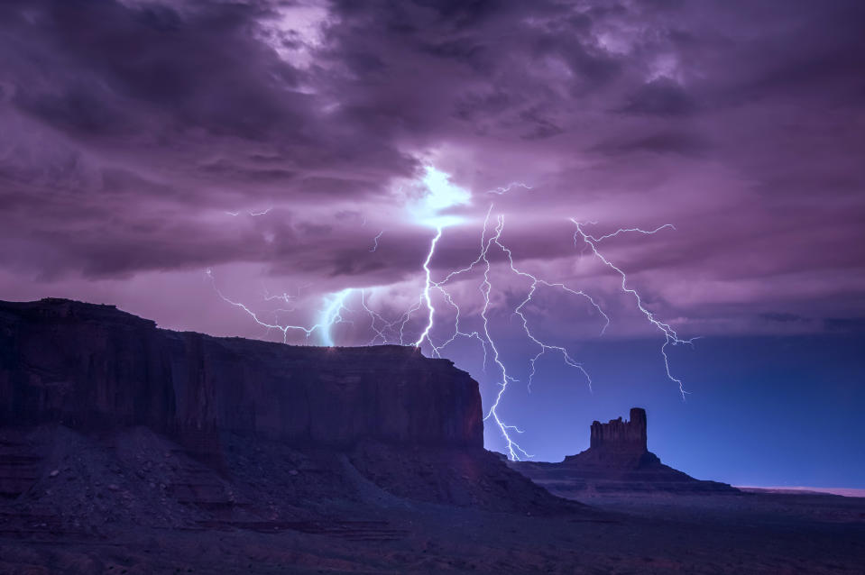 Stunning images capture the moment lightning strikes over Monument Valley